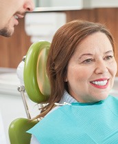 Woman smiling with dentures