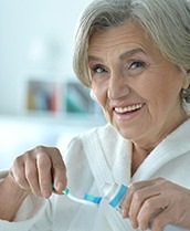 Woman brushing her teeth